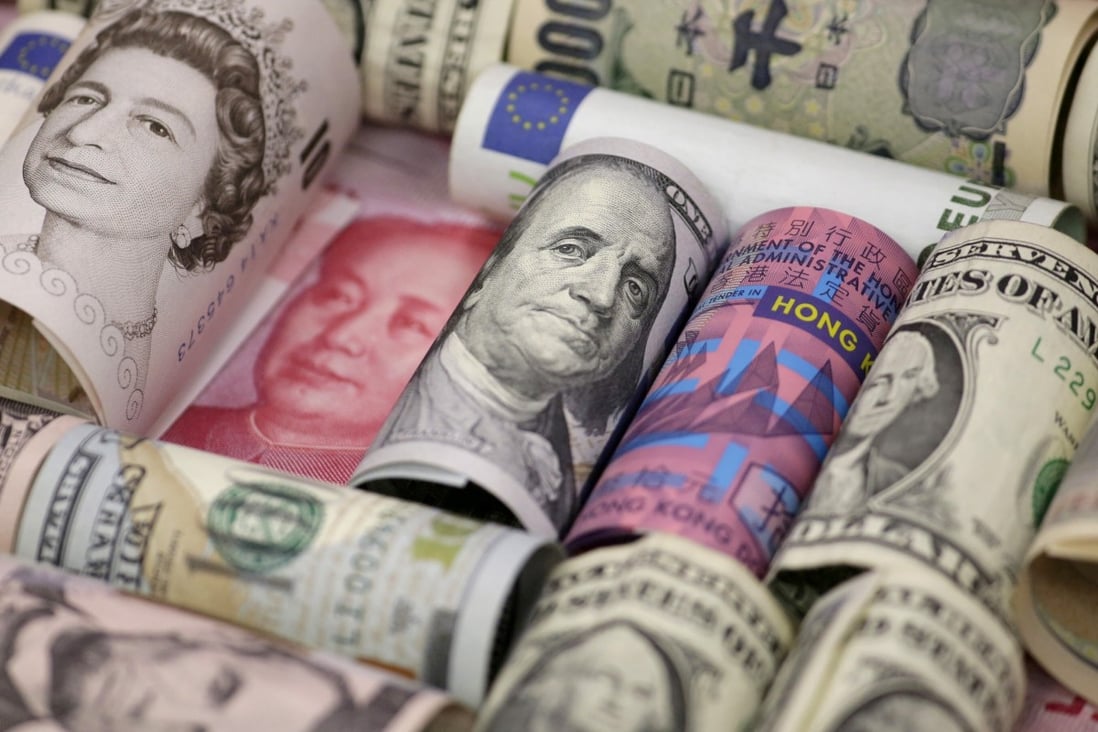 US dollars accounted for 58 per cent of China’s foreign exchange reserves at the end of 2015. Photo: Reuters