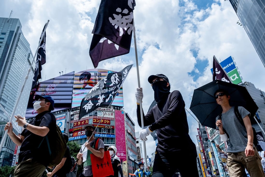 People in Tokyo take part in a protest against China on July 12, following the introduction of the national security law for Hong Kong. Photo: DPA