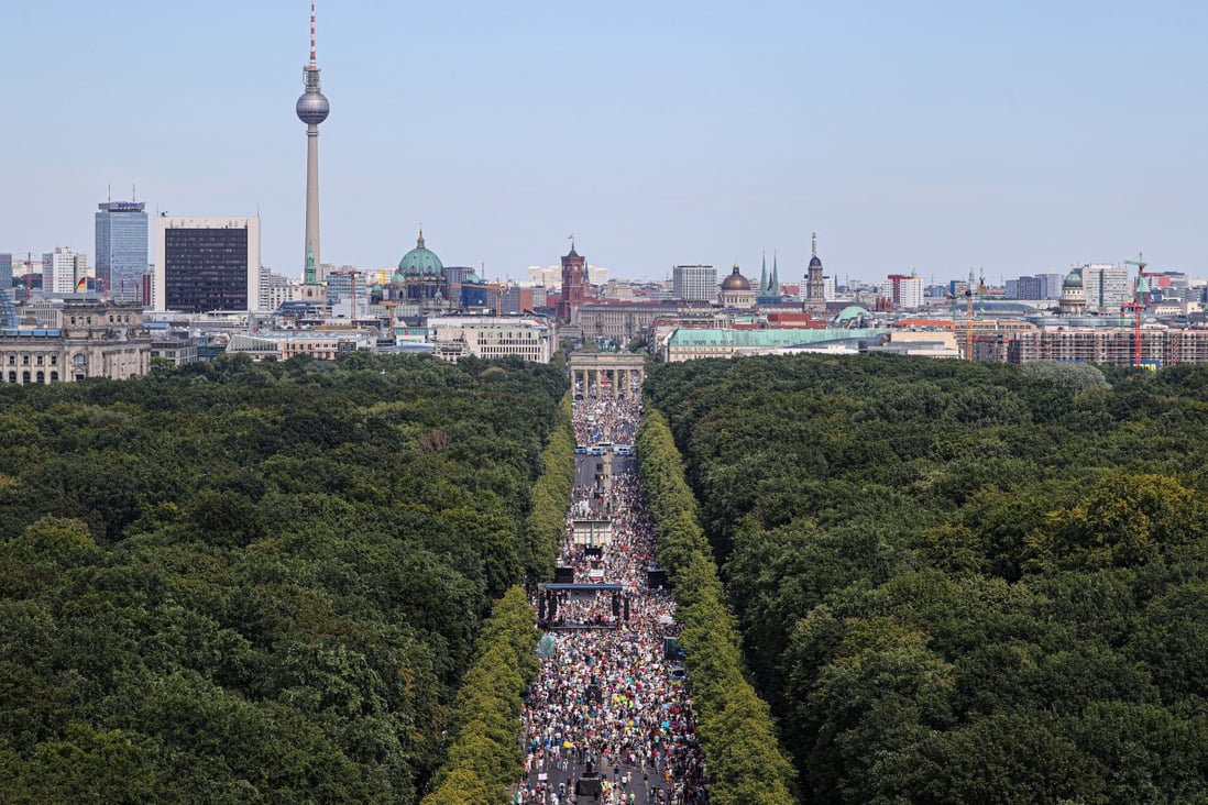 Thousands take part in a protest near Berlin’s Brandenburg Gate against the government's Covid-19 restrictions. Photo: Reuters
