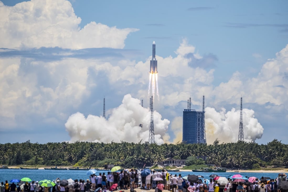 The rocket carrying China's Tianwen-1 Mars rover lifts off in Wenchang, Hainan province, on July 23. While the narrative of a “space race” between China and the United States is emerging, the gap between the two remains too large to generate significant competition. Photo: EPA