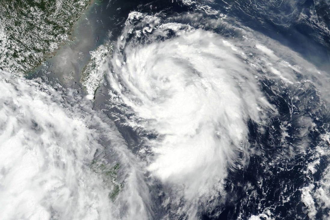 Satellite image released by Nasa shows Typhoon Hagupit over Taiwan (centre left) on Monday. Photo: Nasa Worldview via AP