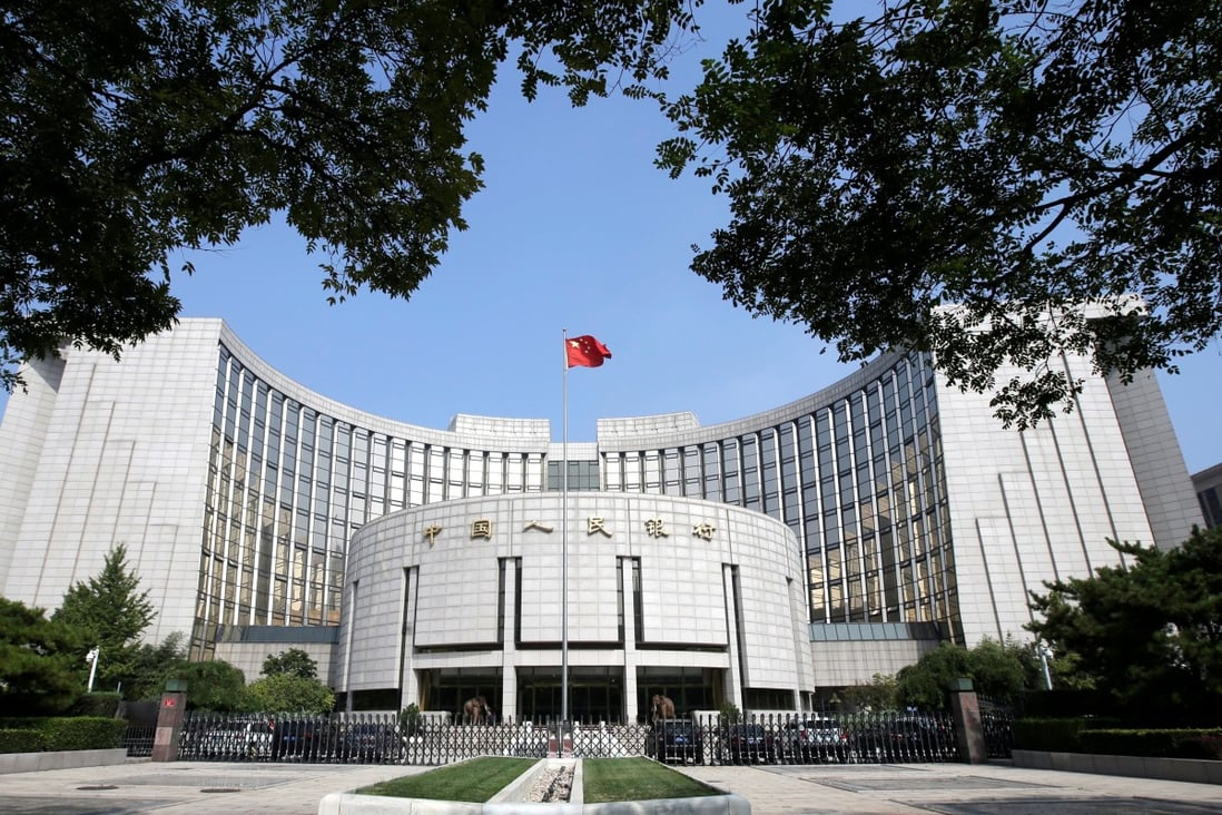 The People’s Bank of China (headquarters in Beijing above) has said that the minimum rates of return on structured deposits should be regulated because they are higher than those of usual bank deposits. Photo: Reuters
