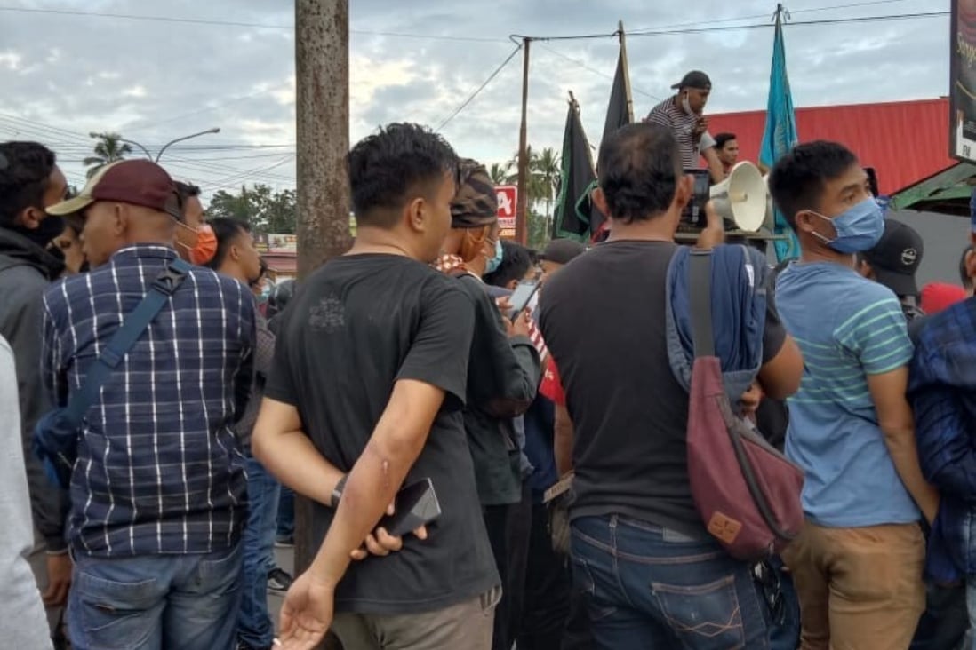 Crowds gather to demonstrate against Chinese workers in Sulawesi, Indonesia. They are also worried the workers may “expose” the local community to Covid-19. Photo: Sulkarnain