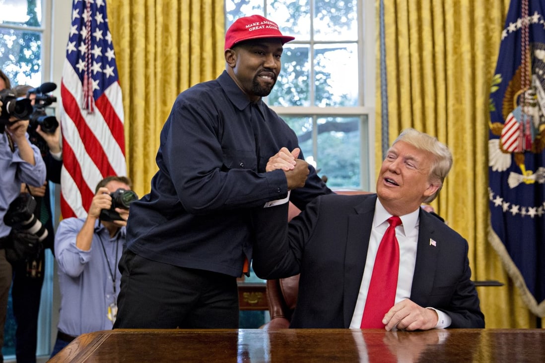 Rapper Kanye West (left) shakes hands with US President Donald Trump during a meeting in the Oval Office of the White House in 2018. Trump says he is not involved in Republican efforts to help get the rapper’s name on the presidential ballot in crucial swing states in November’s election. Photo: Bloomberg