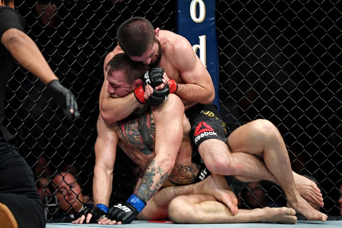 Khabib Nurmagomedov choks Conor McGregor during UFC 229. Photo: Stephen R. Sylvanie-USA TODAY Sports