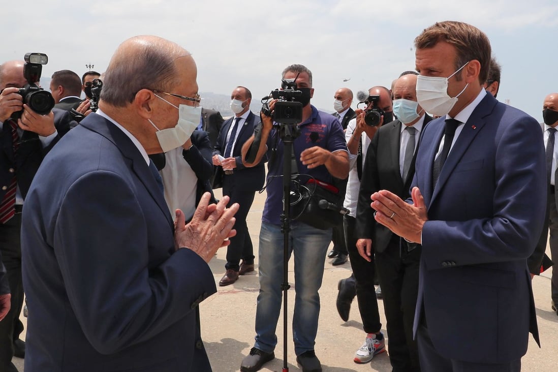 Lebanon’s President Michel Aoun (left) receiving his French counterpart Emmmanuel Macron at the airport in Beirut. Photo: AFP
