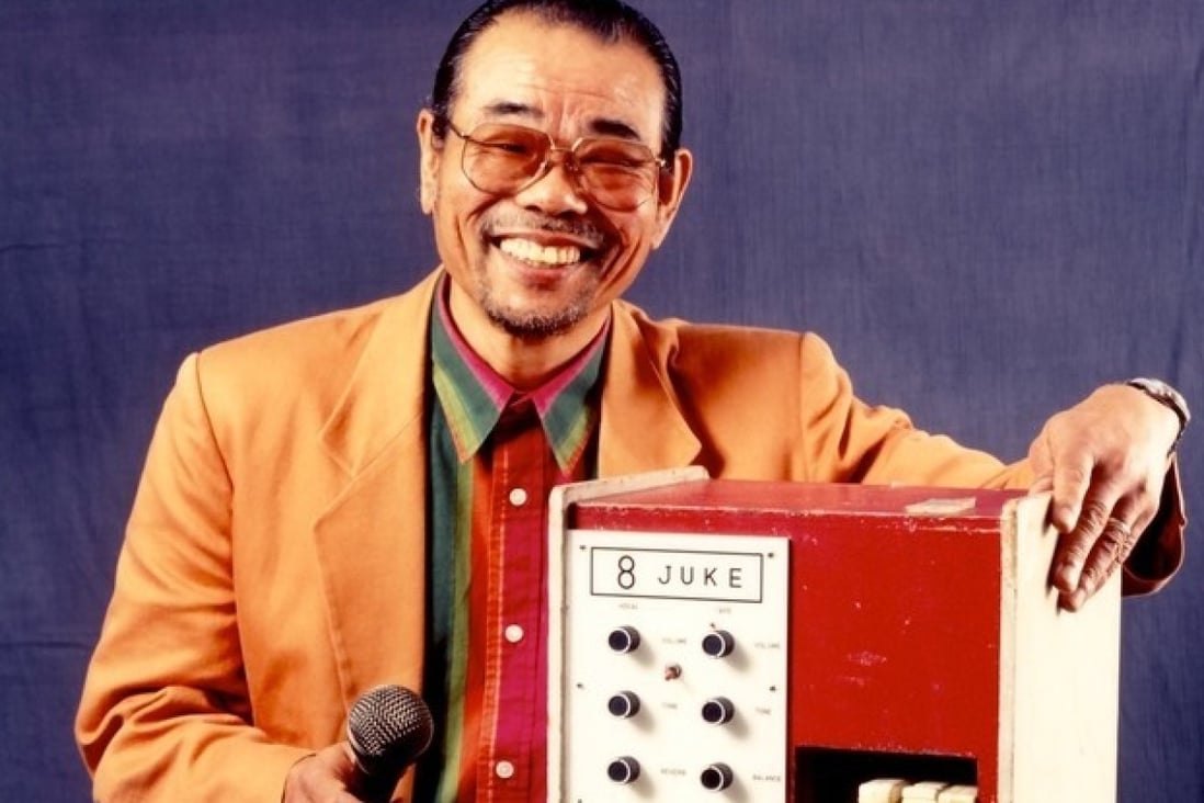 Daisuke Inoue with his creation the Juke 8 karaoke machine. Photo: Daisuke Inoue Young