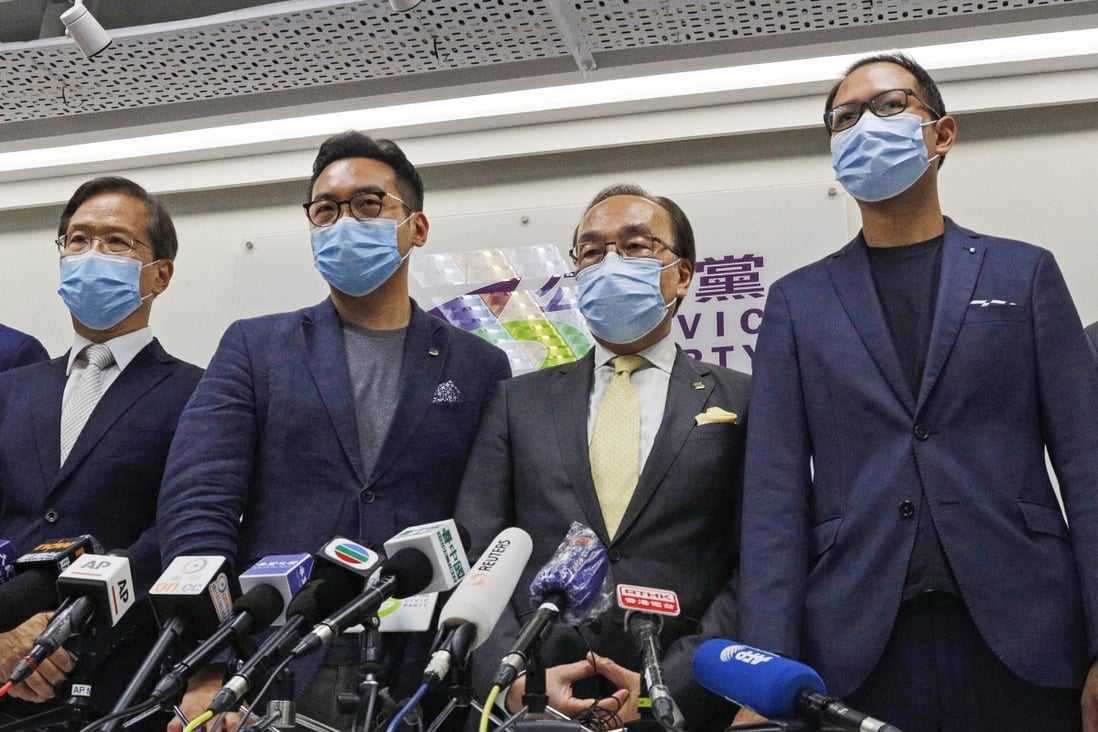 Civic Party members Dennis Kwok (right), Alvin Yeung, (third right), and Kwok Ka-ki (fourth right) attend a news conference after being disqualified from the Legislative Council elections. Photo: AP