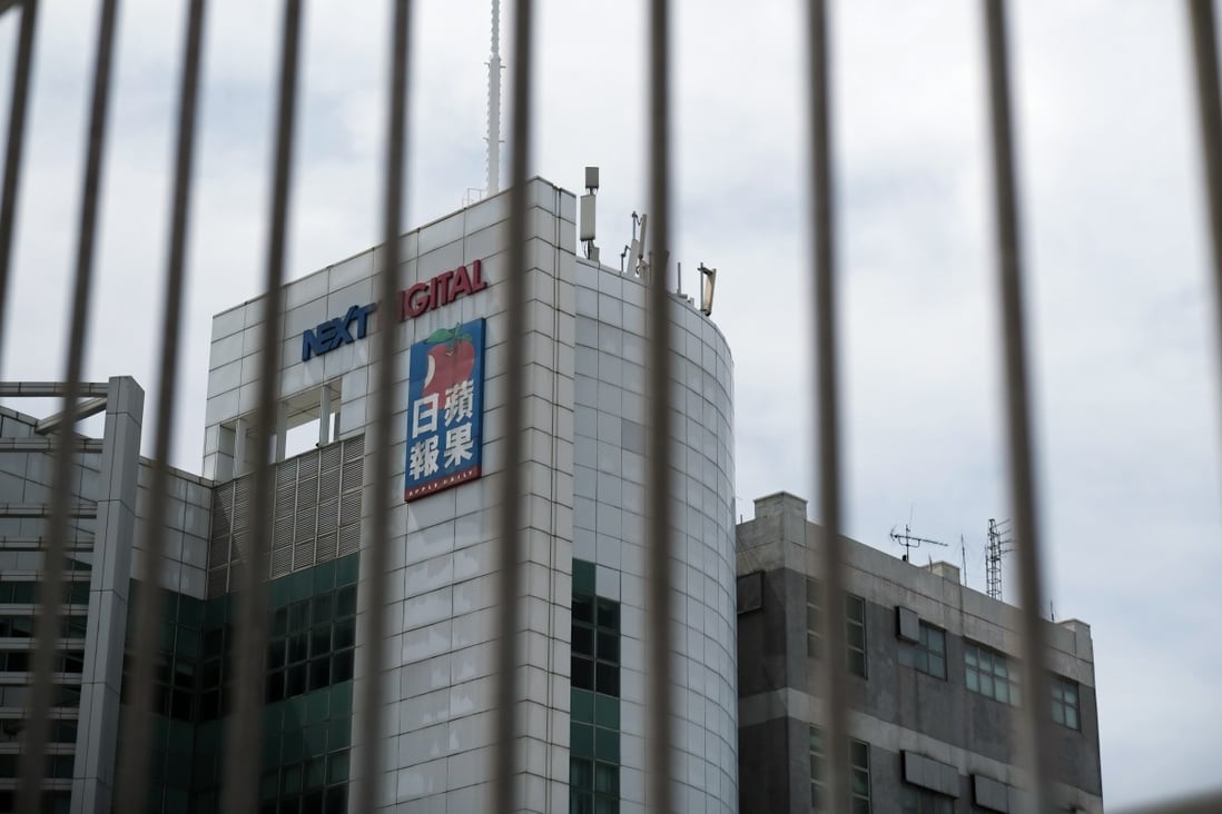 The Next Digital Ltd. offices, which house the newsroom of the Apple Daily newspaper, are seen behind a fence in Hong Kong on Monday. Photo: Bloomberg