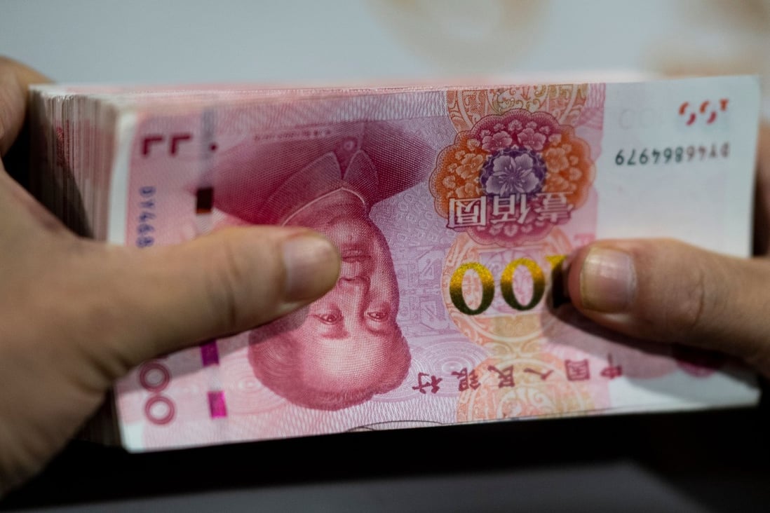 Chinese banks extended 992.7 billion yuan (US$142 billion) in new yuan loans in July, down from 1.81 trillion yuan in June. Photo: AFP
