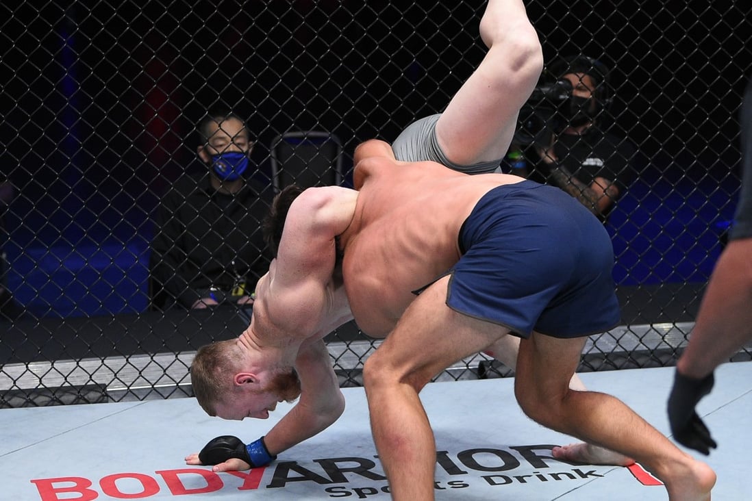 Dustin Stoltzfus slams Joe Pyfer in a middleweight fight during week two of ‘Dana White’s Contender Series’ season four at UFC Apex in Las Vegas. Photos: Chris Unger/DWCS LLC/Zuffa LLC