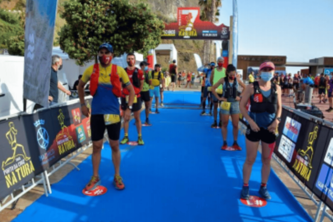 Runners are called to the start in groups and made to distance at the Trail Porto de Cruz in Portugal. Photo: Aurelio Davide