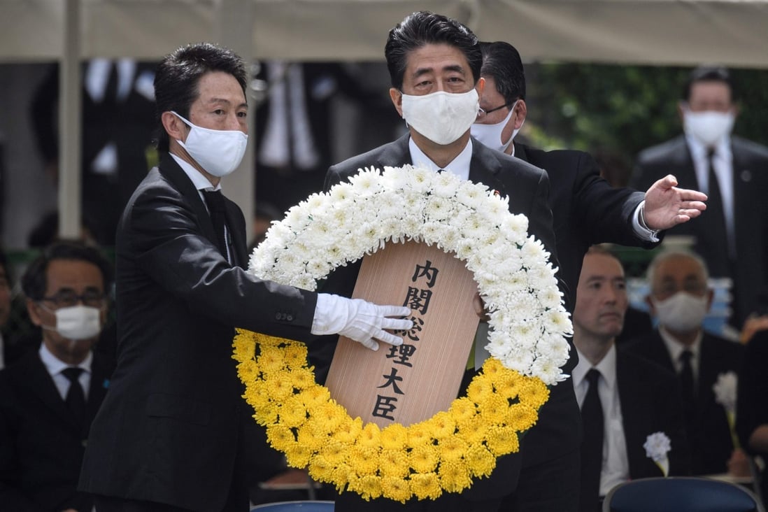 Japanese Prime Minister Shinzo Abe lays a wreath during a ceremony marking the 75th anniversary of the atomic bombing of Nagasaki. Photo: AFP