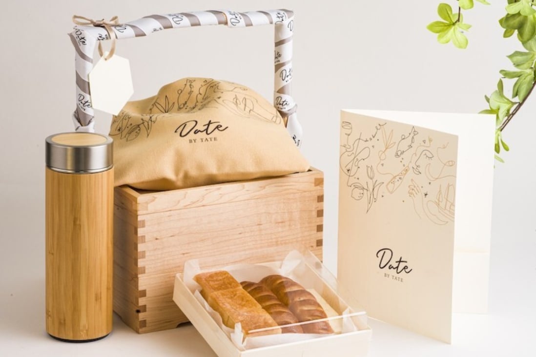 High-end restaurants in Hong Kong, which cannot serve dine-in dinners beause of Covid-19 restrictions, are selling takeaways and meals for delivery for the first time. Wooden packaging is used for Date by Tate’s Gastronomy Box. Photo: Tate