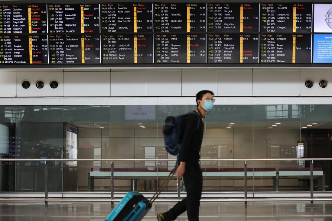 A lone passenger walks through Hong Kong International Airport in February, before the full impact of Covid-19 was felt in the aviation industry. Photo: Winson Wong
