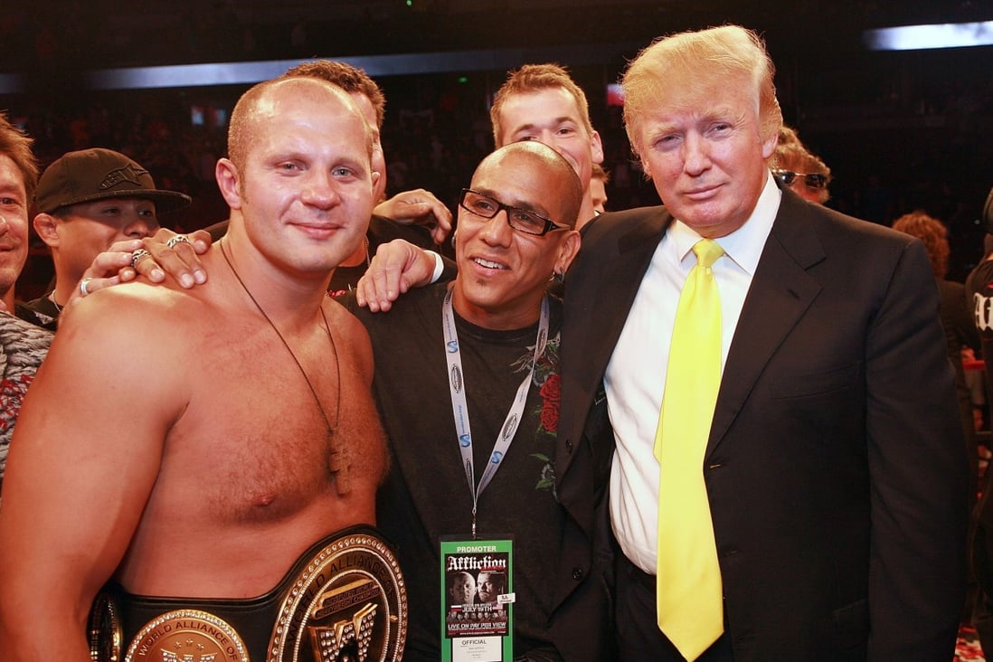Fedor Emelianenko (left) poses with Donald Trump (right) at an Affliction: Banned event at the Honda Center on July 19, 2008 in Anaheim, California. Photo: Tiffany Rose/WireImage