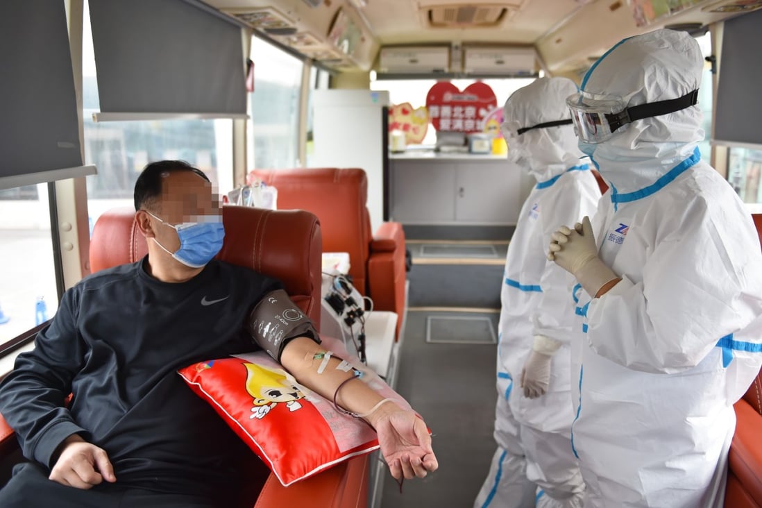 In Beijing, a recovered Covid-19 patient donates plasma on a blood donation bus in February. A study out of the Mayo Clinic in the US has looked at how a plasma infusion rich in specific antibodies may reduce the mortality rate among the very ill. Photo: Xinhua