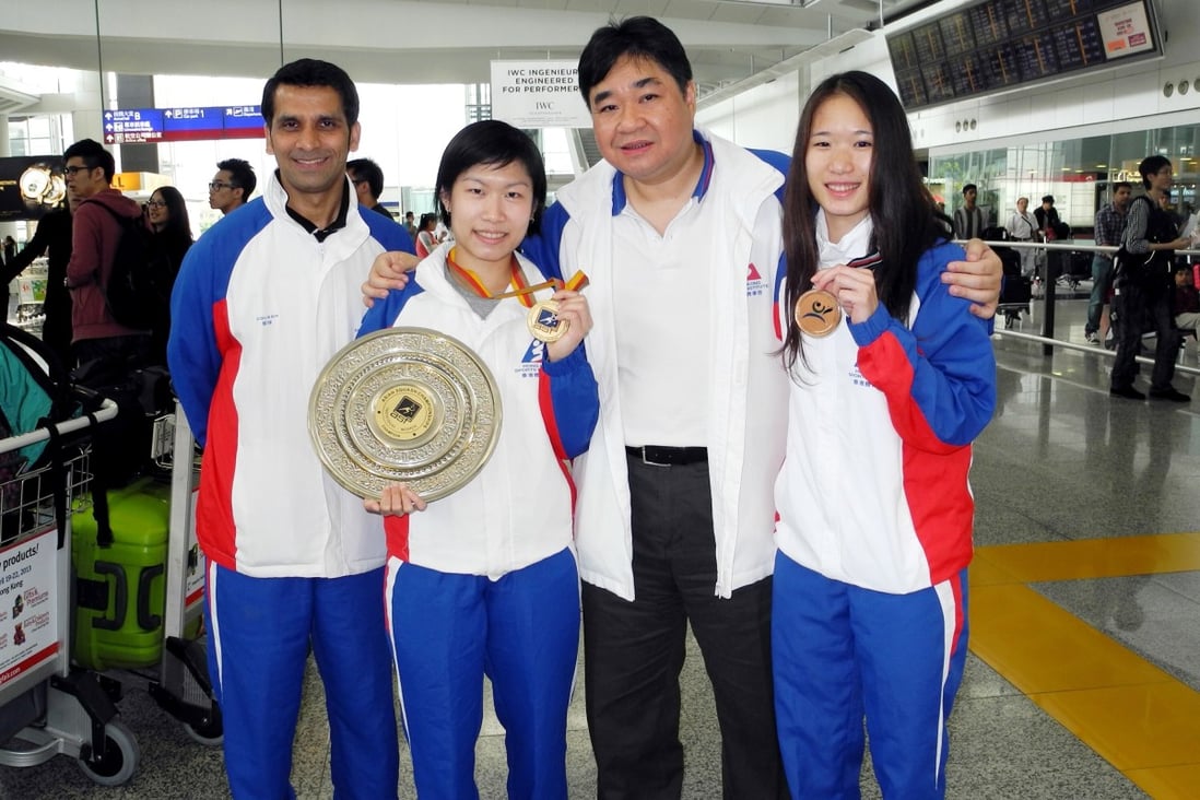 Tony Choi, then squash head coach, with Annie Au Wing-chi (second from left) and Joey Chan Ho-ling and fellow coach Faheem Khan after winning gold and bronze at the 2015 Asian Championships. Photo: Handout