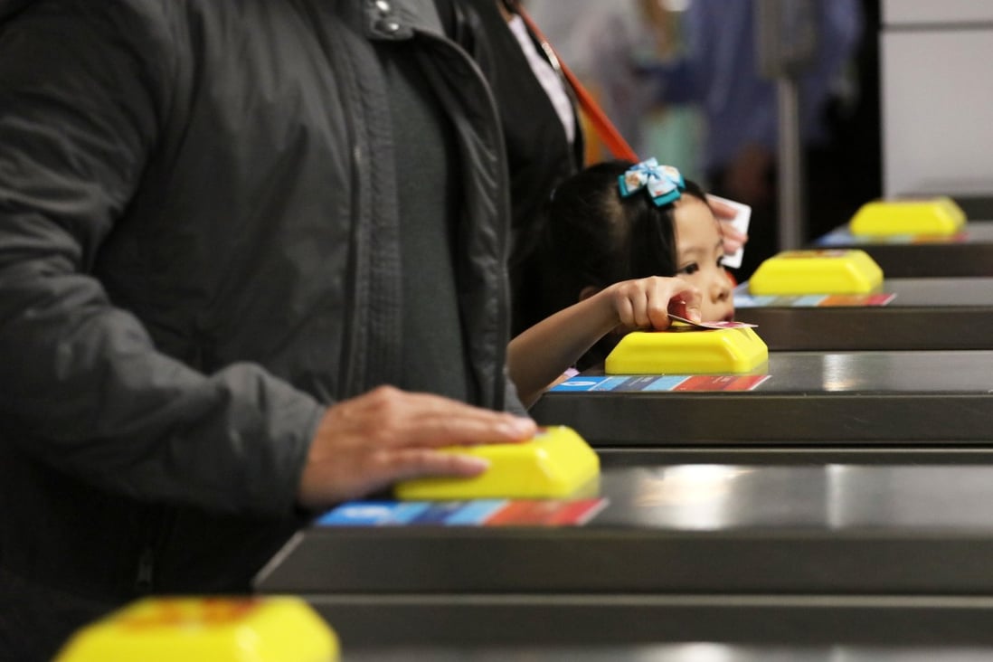 Passengers use their Octopus cards at the Admiralty MTR station. Photo: Felix Wong