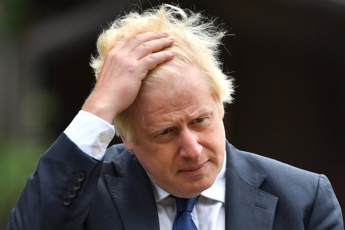 Britain's Prime Minister Boris Johnson attends an event at the National Memorial Arboretum in Alrewas, central England on Saturday. Photo: AFP