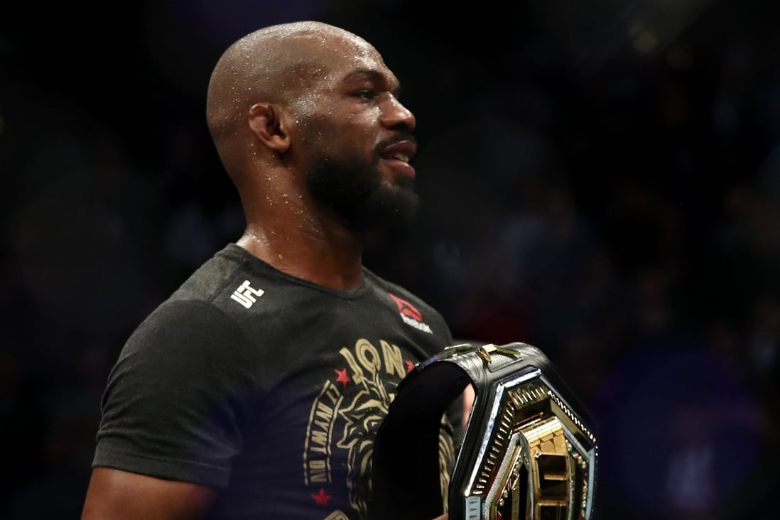 Jon Jones celebrates his win against Dominick Reyes in their UFC light heavyweight championship bout during UFC 247. Photo: AFP