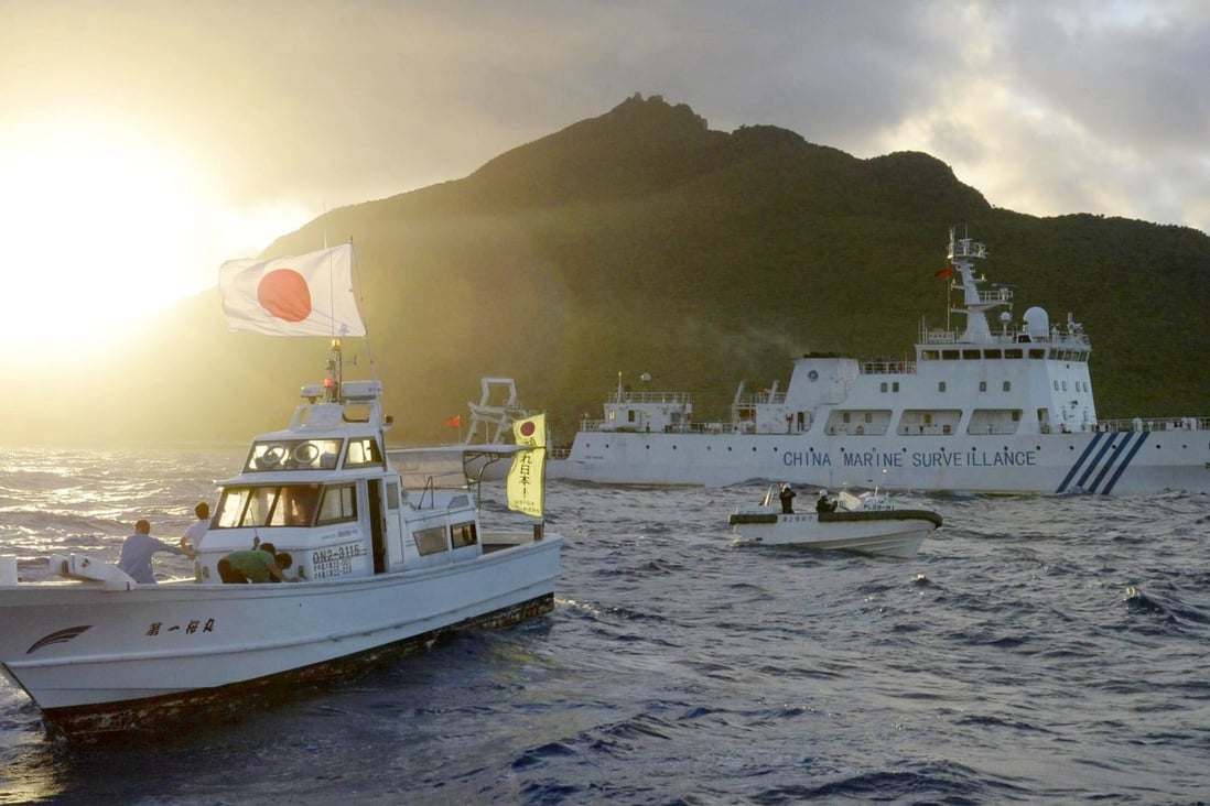 A July 2013 photo shows Chinese and Japanese vessels near the disputed islands. Photo: Kyodo