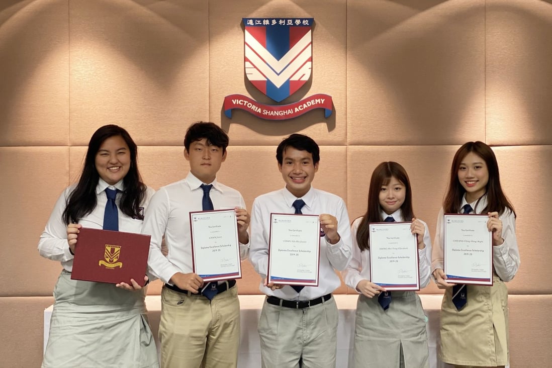 Victoria Shanghai Academy student Jason Chan (second left), who previously scored a 44 on the International Baccalaureate, saw his grade improve to a perfect 45 after adjustments. Photo: Chan Ho-him