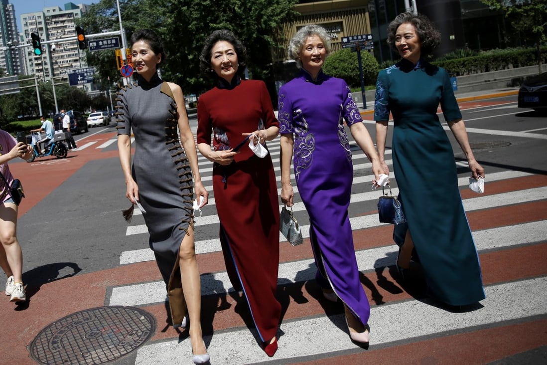 Four famous amateur model grandmothers took off their masks and walked down a street in Beijing to celebrate life returning to normal as the Covid-19 pandemic eases. Photo: Reuters