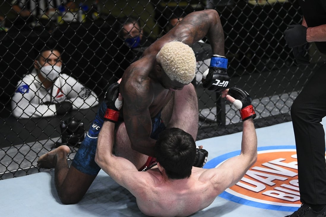 Trevin Jones punches Timur Valiev in their fight during the UFC Fight Night event at UFC Apex on August 22, 2020 in Las Vegas, Nevada. Photos: Chris Unger/Zuffa LLC