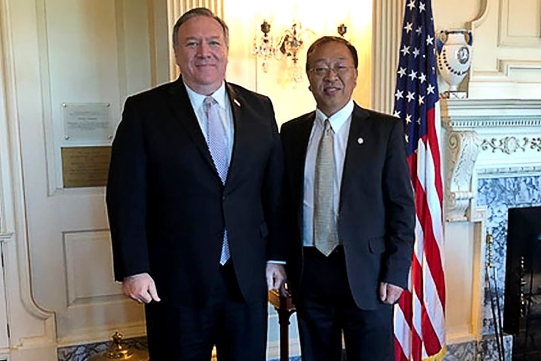 United States Secretary of State Mike Pompeo with policy adviser Miles Maochun Yu. Photo: US State Department
