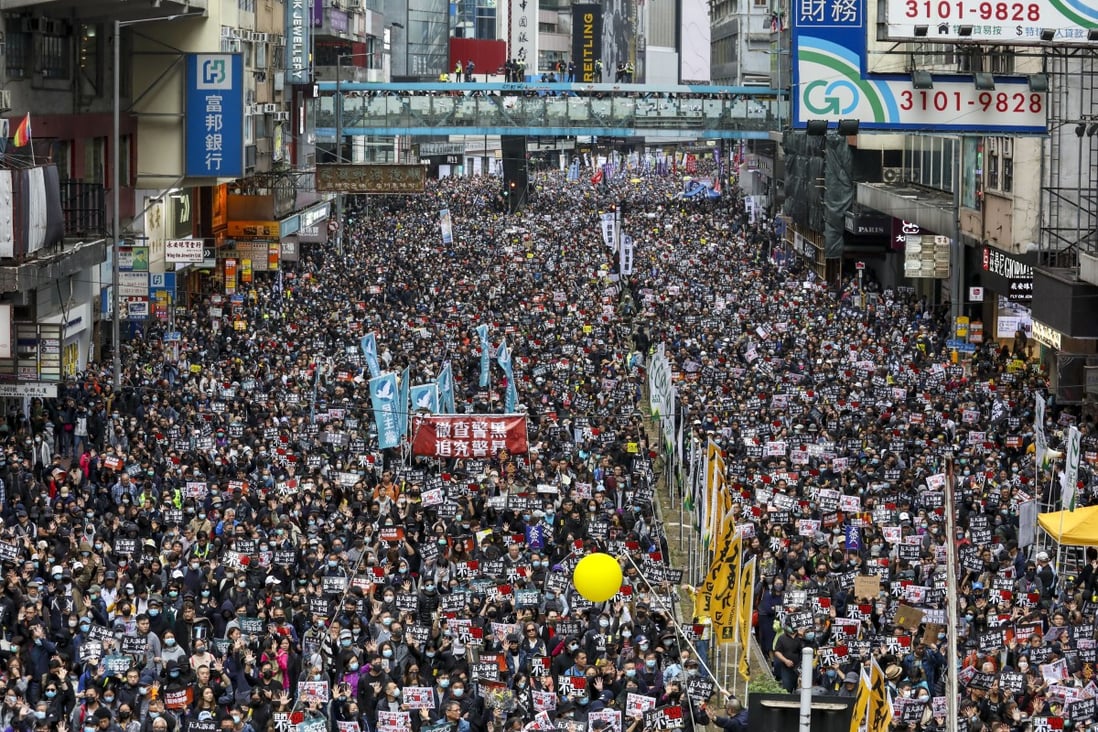 Anti-government protesters participate in a New Year's Day march organised by the Civil Human Rights Front on Hennessy Road in Causeway Bay earlier this year. Photo: Nora Tam