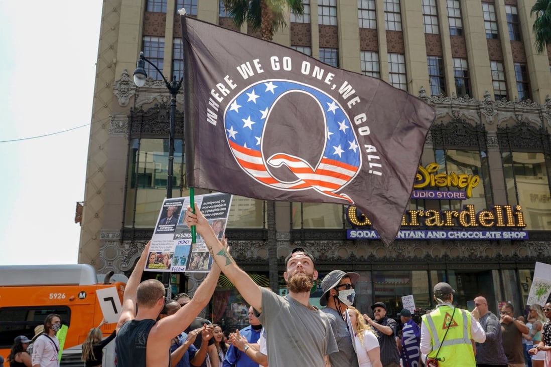 QAnon conspiracy theorists protest against child trafficking on Hollywood Boulevard in Los Angeles. Photo: AFP