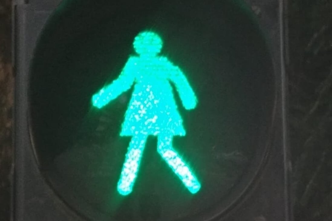 The Mumbai authorities have replaced the traditional male stick figures with female silhouettes on more than 100 traffic lights. Photo: Twitter