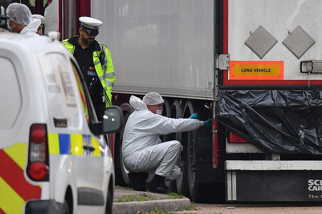British police forensics officers inspect the truck that contained 39 dead bodies at Waterglade Industrial Park in Grays, east of London. Photo: AFP