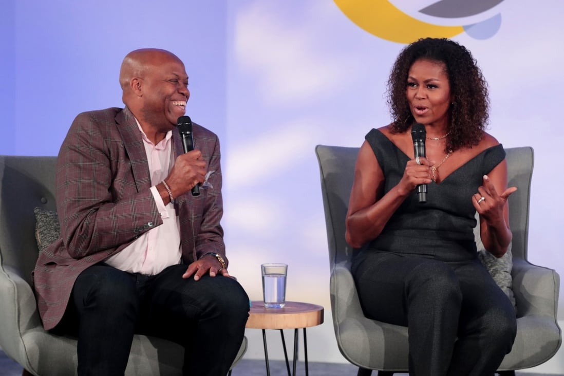 Former first lady Michelle Obama and her brother Craig Robinson speak to guests at the Obama Foundation Summit at Illinois Institute of Technology. Photo: TNS