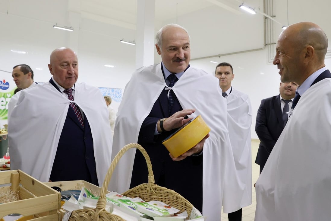 President Alexander Lukashenko visits a cheese-making factory in Orsha, Belarus. Photo: Belta via Reuters