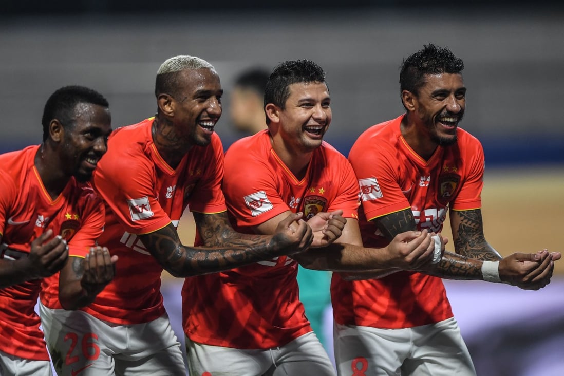 Guangzhou Evergrande’s Fernandinho, Anderson Talisca, Elkeson and Paulinho celebrate a goal in their win over Shanghai Shenhua. Photo: Xinhua
