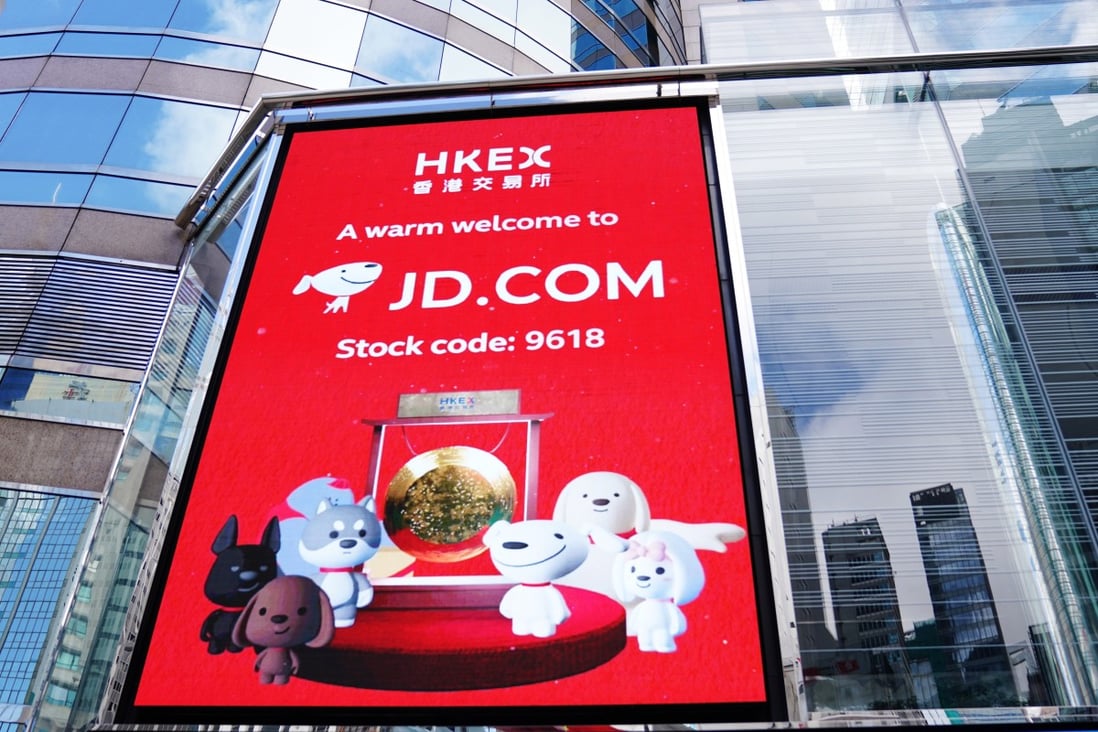 A screen showing the listing of JD.com in Hong Kong outside the trading hall of Hong Kong Exchanges and Clearing on June 18. Photo: Xinhua