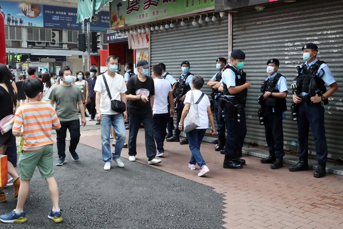 Police officers were out in force in Mong Kok on Sunday. Photo: Edmond So