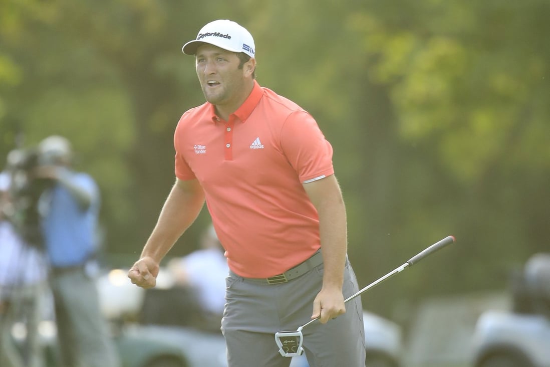 Jon Rahm celebrates his 66-foot putt to defeat Dustin Johnson in a sudden death play-off for the BMW Championship. Photo: AFP