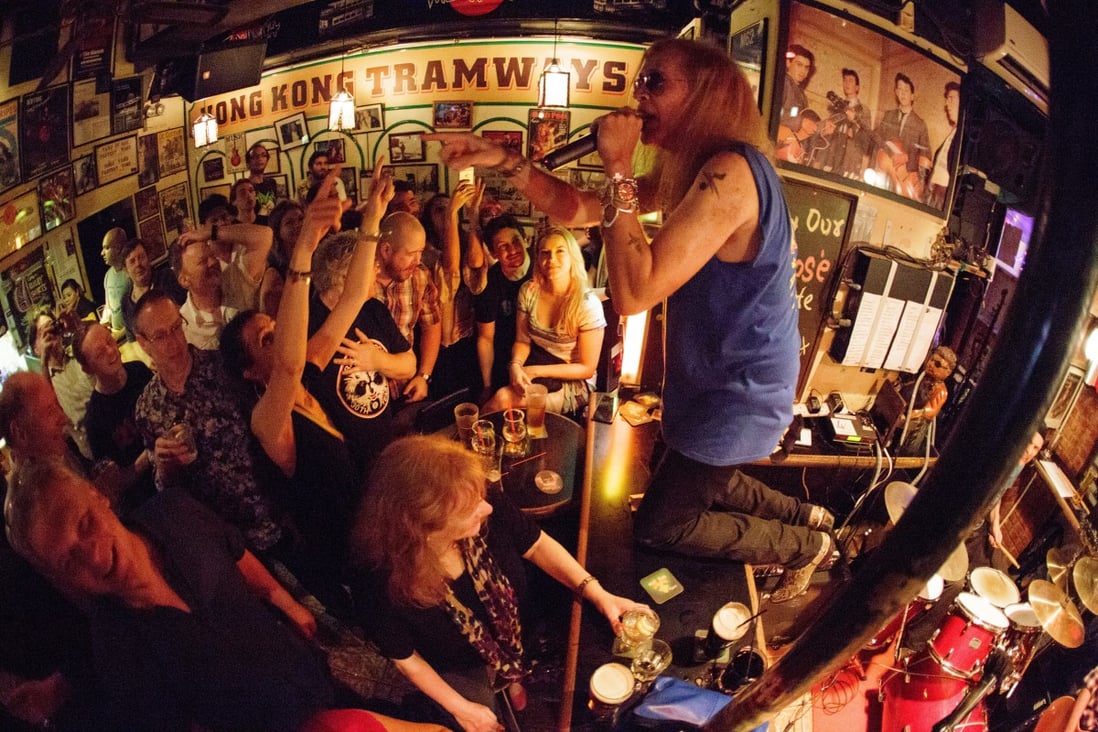 The Wanch co-owner John Prymmer performs with Don’t Panic at the live-music venue in Wan Chai. The bar will vacate its premises and has suspended operations until the coronavirus crisis is over. Photo: Hongkong-rocks