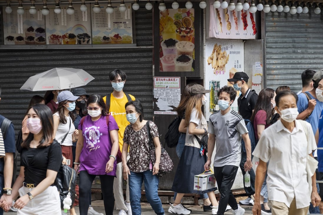Pedestrians in front of a closed business in Mong Kok on 22 August 2020. Photo: EPA-EFE