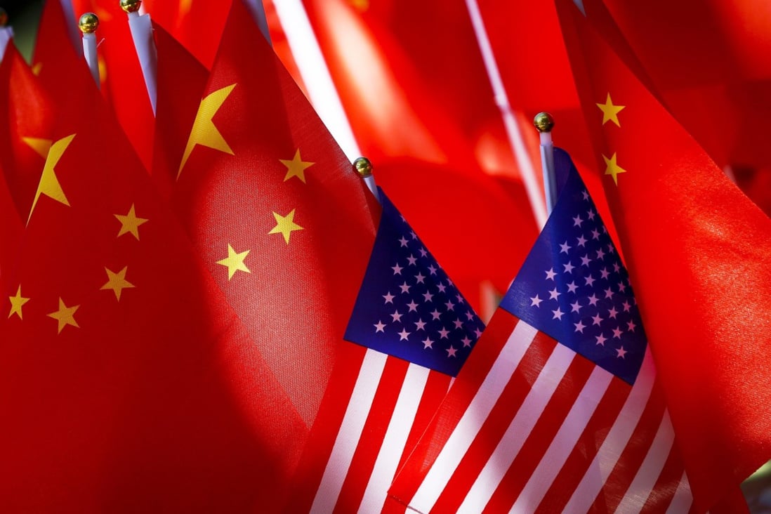 American flags are displayed together with Chinese flags in Beijing. Photo: AP Photo