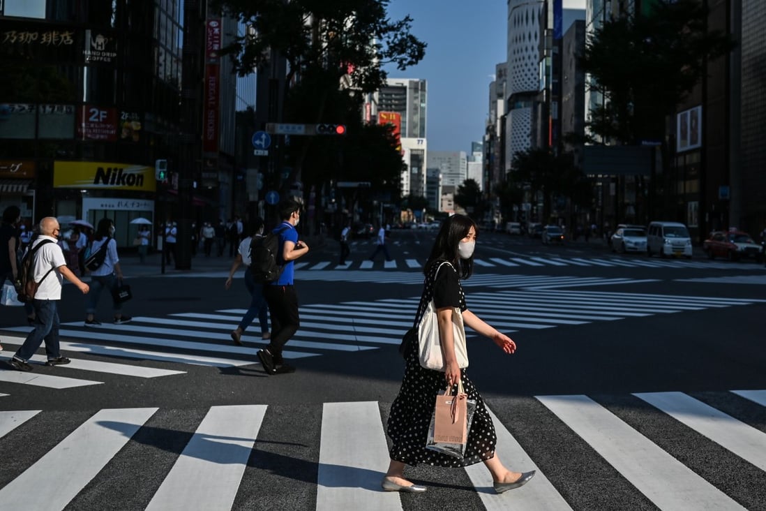 The coronavirus pandemic has reduced working hours in Japan by 10 to 20 per cent, according to the study. Photo: AFP