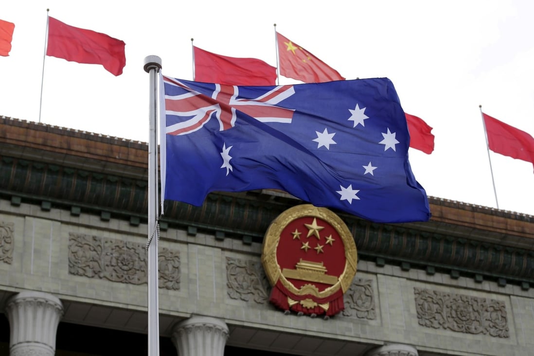 An Australian flag in front of the Great Hall of the People in Beijing. Photo: Reuters