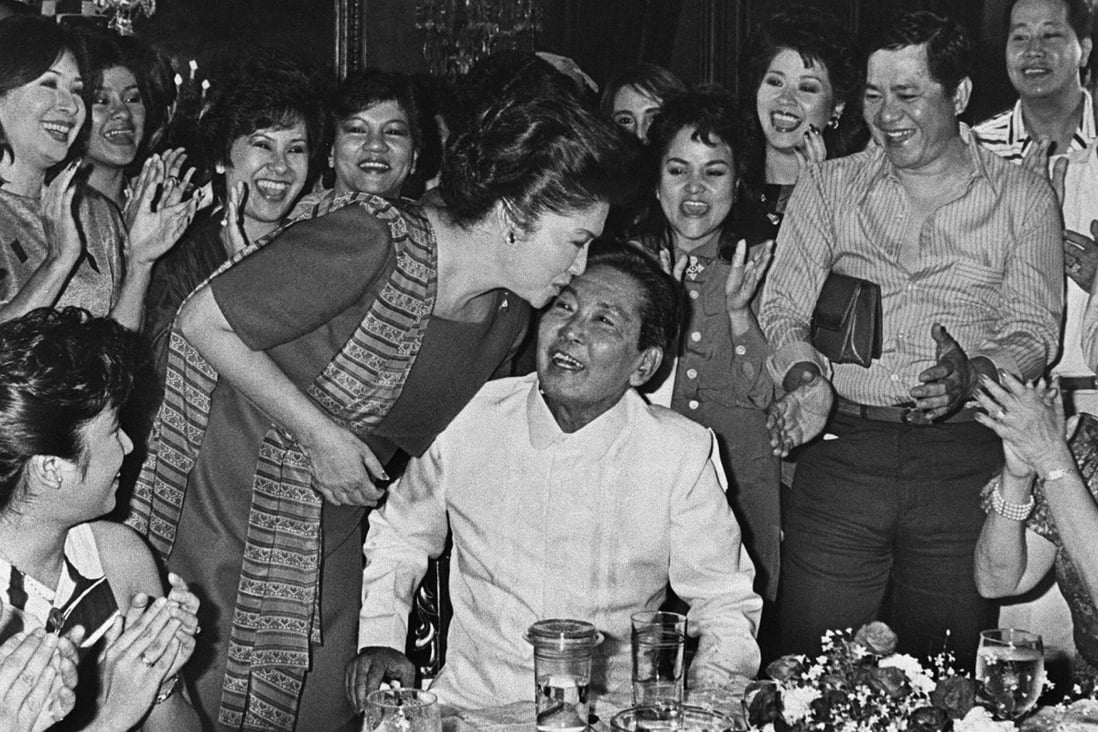 Ferdinand Marcos receives a kiss from his wife Imelda following his victory in the 1986 presidential election. Photo: AFP