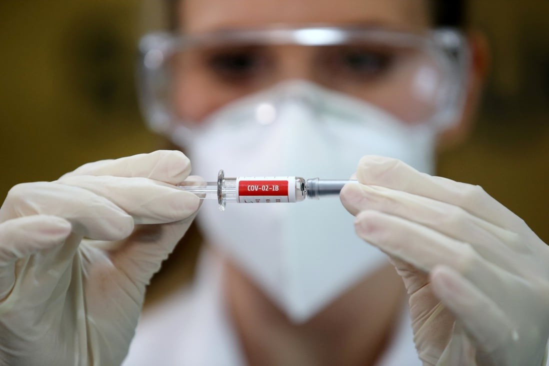 A nurse holds a syringe containing China’s Sinovac vaccine at a hospital in Porto Alegre, Brazil in August. Photo: Reuters