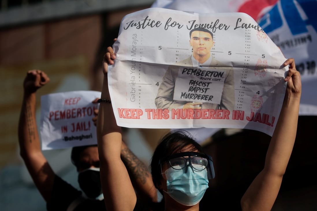 Members of an LGBT group gather for a protest on Tuesday after Philippine President Rodrigo Duterte pardoned US soldier Lance Corporal Joseph Scott Pemberton, who was convicted of killing Filipino transgender woman. Photo: Reuters