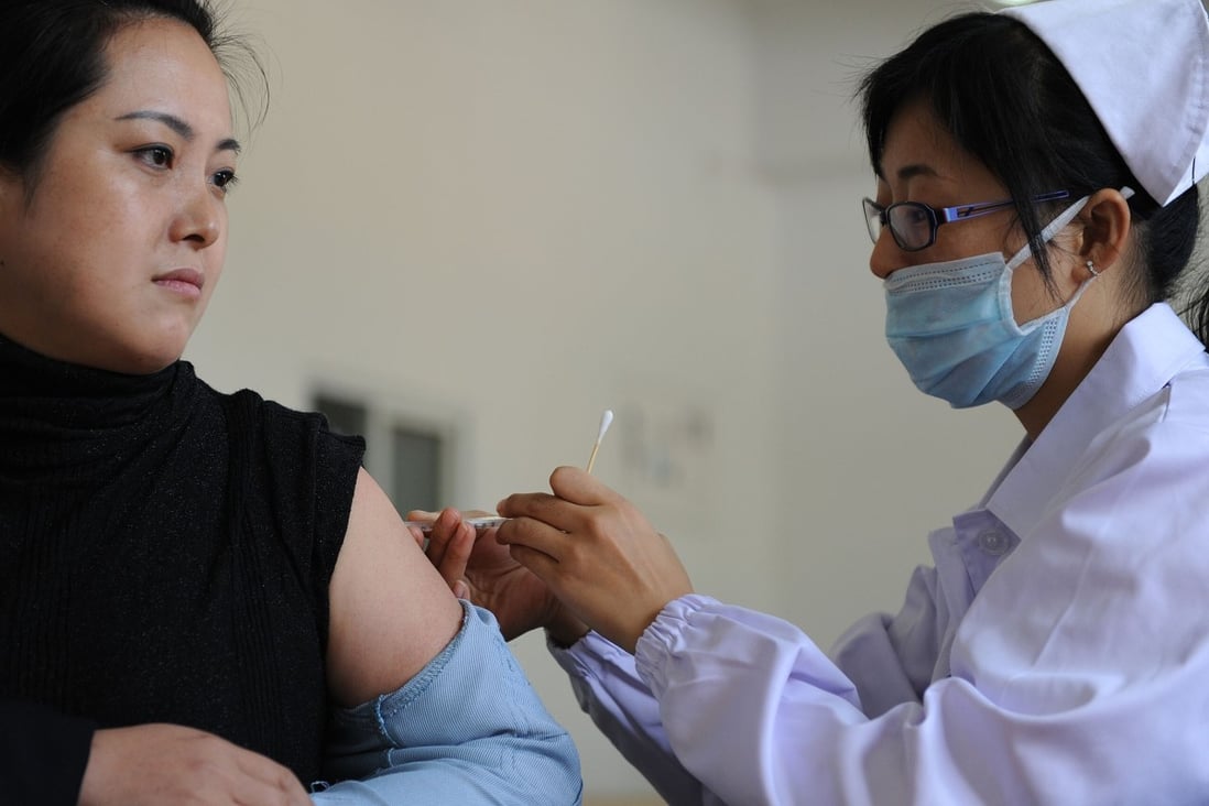 China is ramping up production of flu vaccines to ward off double threat of influenza and Covid-19. Photo: AFP