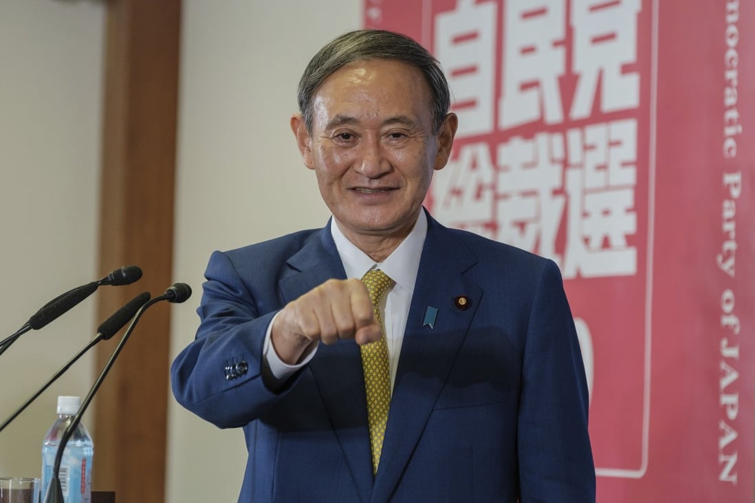 Yoshihide suga elected japanese prime minister